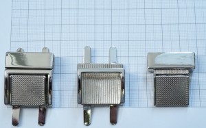 Замок для сумки. Никель 27х30 мм