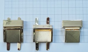 Замок для сумки. Золото 27х30 мм