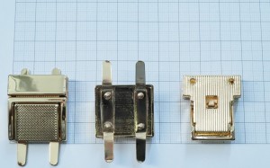 Замок для сумки. Золото 27х30 мм