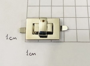 Замок для сумки. Никель 25х15 мм