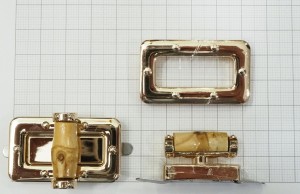 Замок для сумки. Золото 41х25 мм