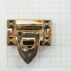 Замок для сумки. Золото 41х23 мм